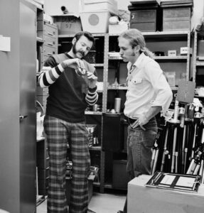 John Bache in the film cage with a student