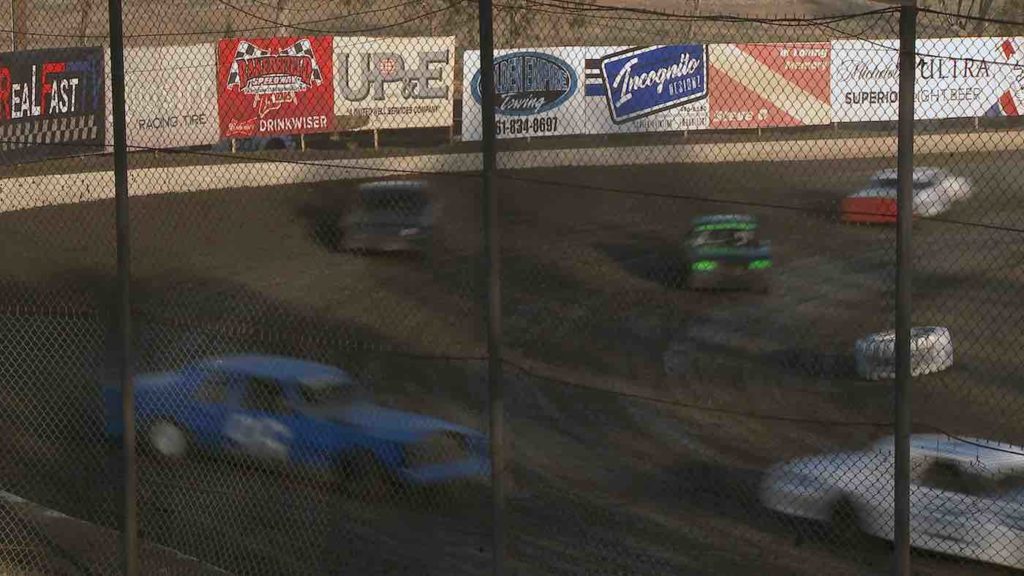 cars racing on a racetrack
