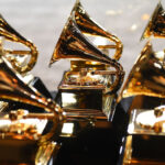several grammy awards sitting on a table