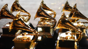 several grammy awards sitting on a table