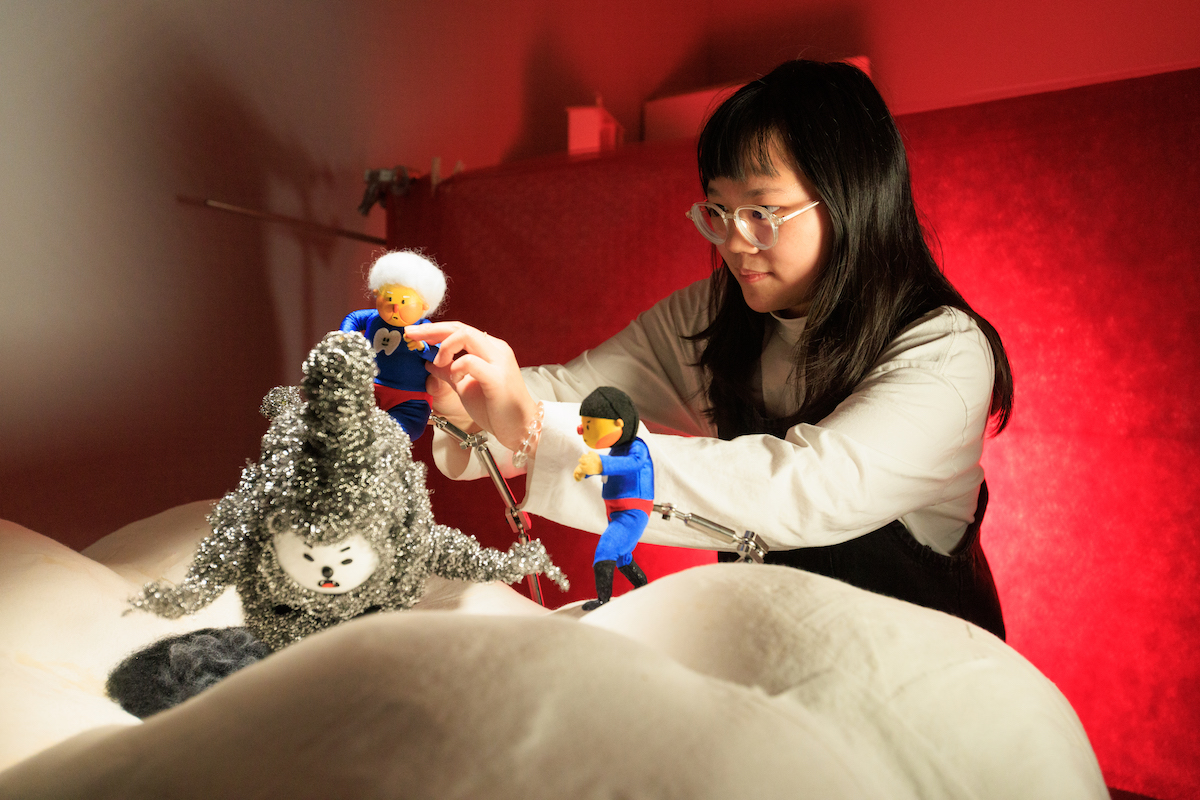 woman working with figurines
