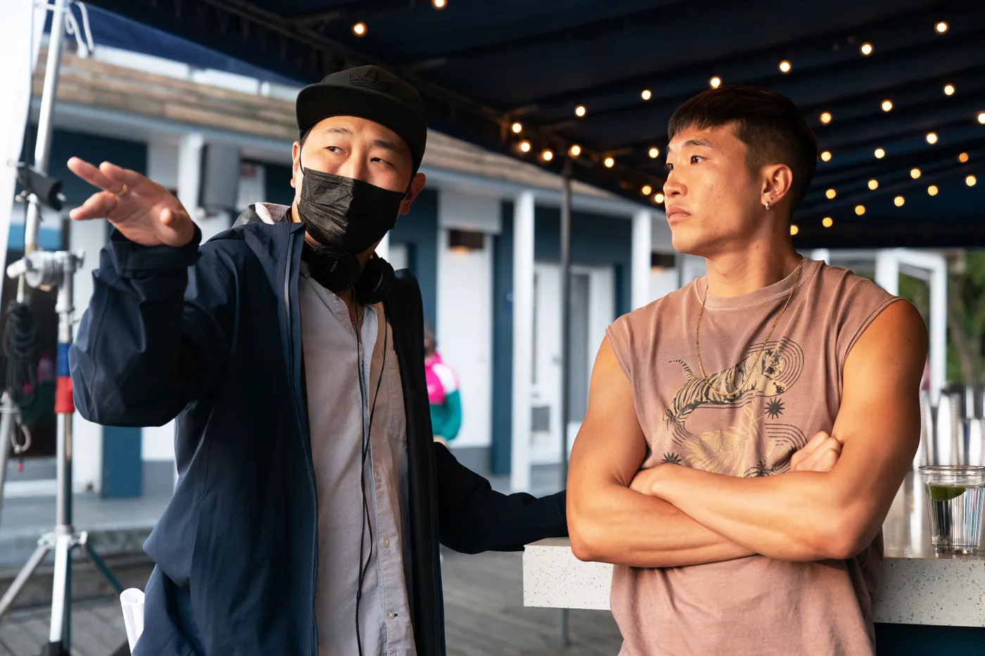 Andrew Ahn and Joel Kim Booster on the set of the film FIRE ISLAND. Photo: Jeong Park/Courtesy of Searchlight Pictures.