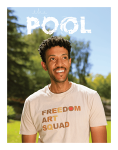 Foremost wearing a Tshirt outdoors that reads Freedom Art Squad