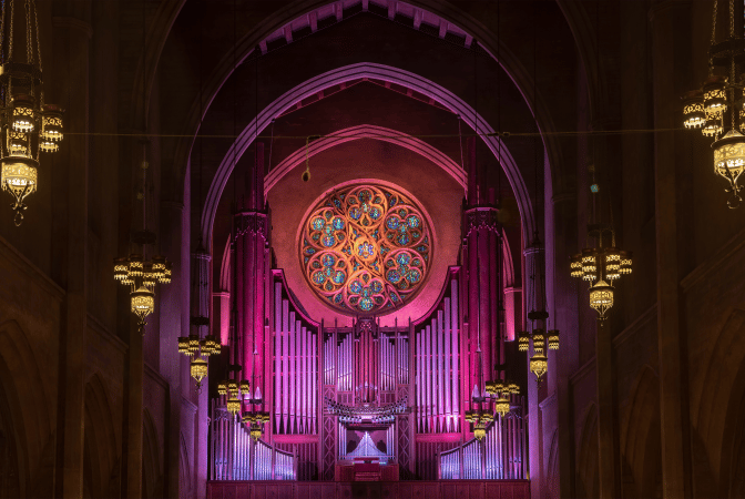 Pink- and purple-lit church interior