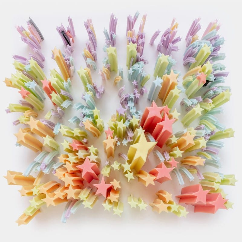 Colorful arrangement of silicon stars in varying sizes and lengths