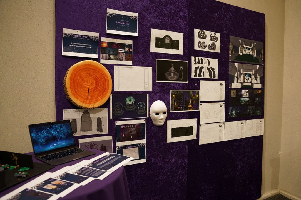 A purple presentation board with concept artwork.