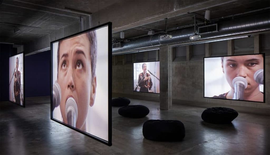 A film installation on display in a museum gallery.