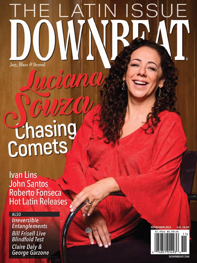 Front cover of DownBeat magazine with Luciana Souza in a flowing red outfit