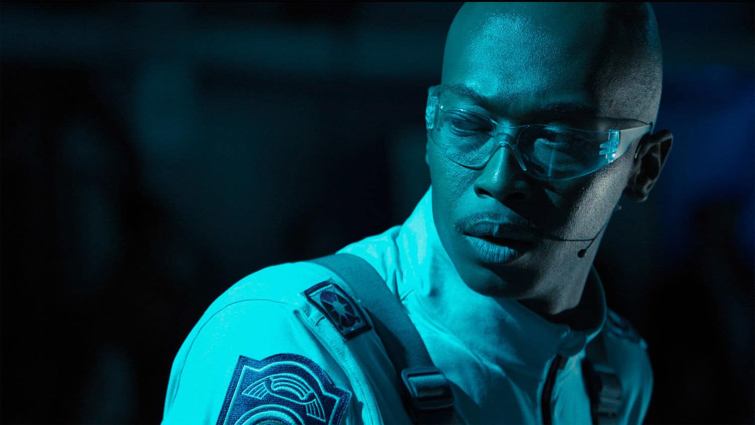 Man in interstellar space crew costume.