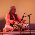 Swapan Chaudhuri playing tabla on the Wild Beast stage.