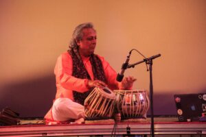Swapan Chaudhuri playing tabla on the Wild Beast stage.