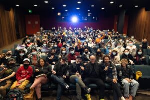 The panelists and students at the 'Spider-Man: Across the Spider-Verse' in the Bijou Theater.