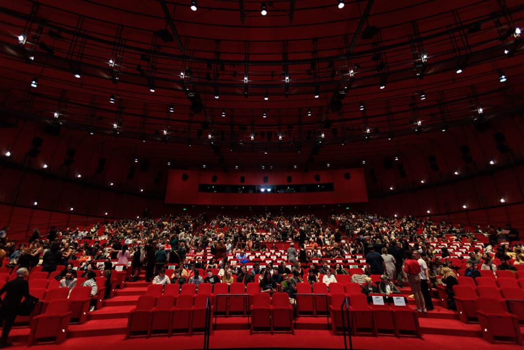 View of large red theater from the stage.