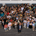 Overhead group photo of Pete Docter and Character Animation students.