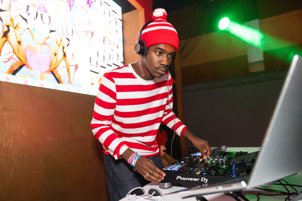 DJ dressed as Waldo at the turntable