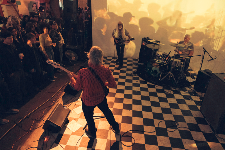 Overhead view of Suburban John performing to an audience
