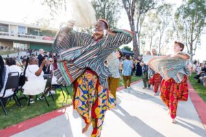 The African Drumming and Dance ensemble leads the CalArts 2026 graduation processional.