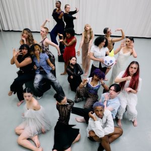 Dance students pose in a studio