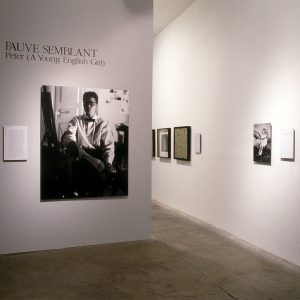 Gallery wall with black and white portrait beneath text "Fauve Semblant: Peter (A Young English Girl)"